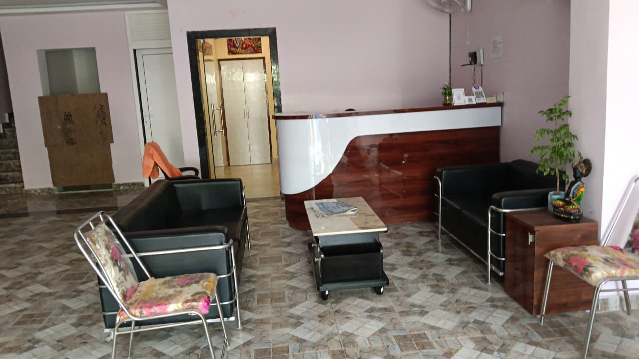 Front desk and welcome area at Durgesh Inn Hotel Paharia